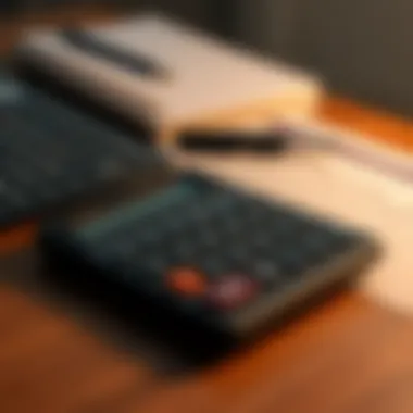 Budgeting for Insurance Premiums A calculator and budget planner on a desk