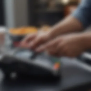 Close-up of a person using Apple Pay at checkout